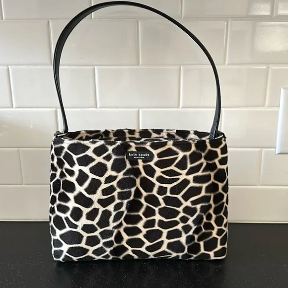 Kate Spade, Giraffe Faux Fur Animal Print Leather Handbag. Stain inside purse. - Picture 1 of 7